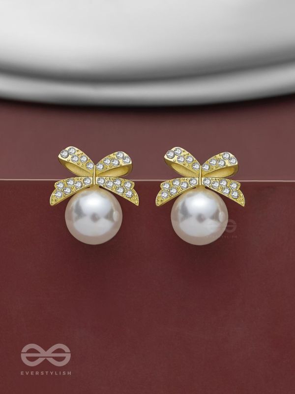 BOW-DAZZLE PEARLS - GOLDEN AND WHITE EMBELLISHED EARRINGS