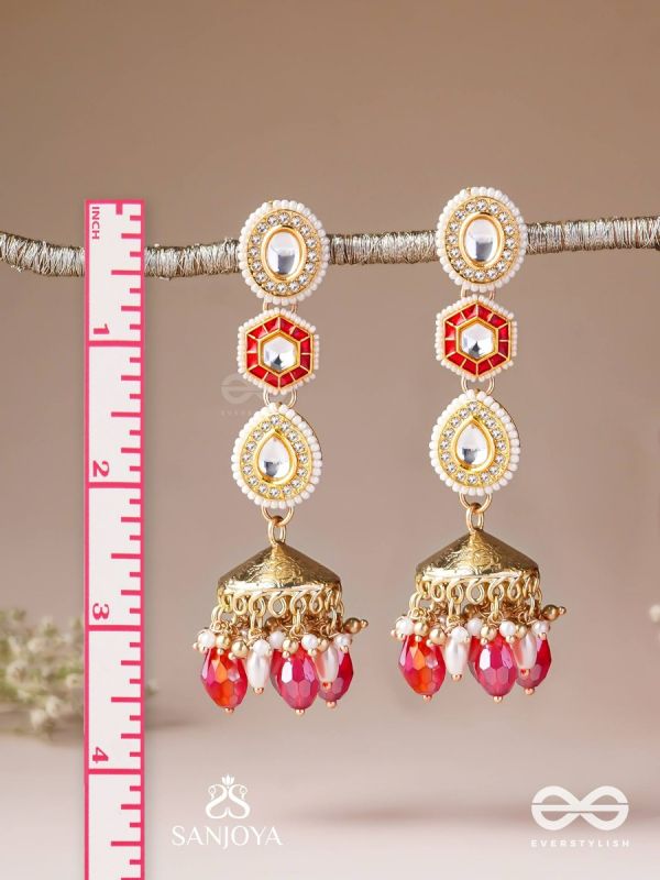 Suvarnmani - The Golden Gem –Golden enamel earrings adorned with gemstones and dangling beads