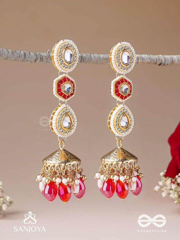 Suvarnmani - The Golden Gem –Golden enamel earrings adorned with gemstones and dangling beads