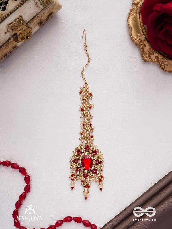 Kumudinikunda-Delicate lotus-Embroidered hair accessory with a red stone & golden embellishments
