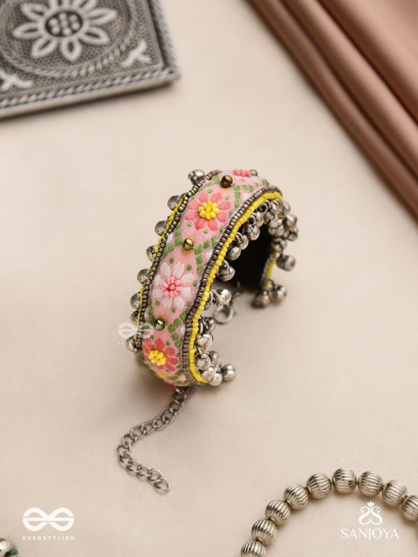 SUMANALEKHA-FLORAL PATTERN- SEMI-OXIDIZED BRACELET FEATURES GHUNGROO, BEADS, AND EMBROIDERED FLOWERS
