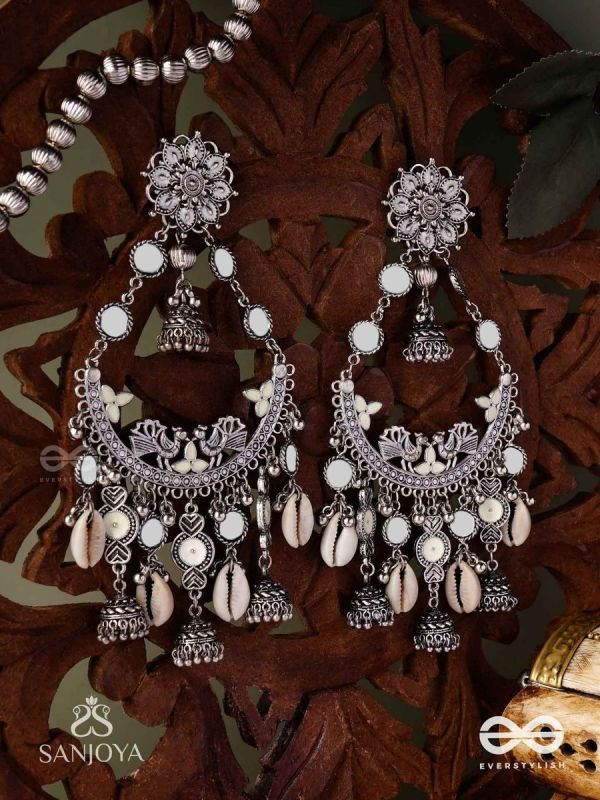 CHANDRAMAYURA- MOON-PEACOCK EARRINGS- OXIDIZED CHAANDBAALI EARRINGS, ADORNED WITH MIRRORS, GHUNGHROOS, COWRIE SHELLS, AND DANGLING JHUMKA