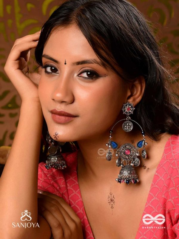 SHUBHRAVILASA- RADIANT GRACE- SILVER TONED EARRINGS, CIRCULAR MOTIFS ADORNED WITH GHUNGROOS AND JHUMKA