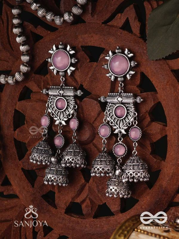 VIJAYAMUKTA-VICTORY PEARLS- REGAL OXIDIZED EARRINGS WITH A CENTRAL PURPLE STONE AND LAYERED JHUMKAS