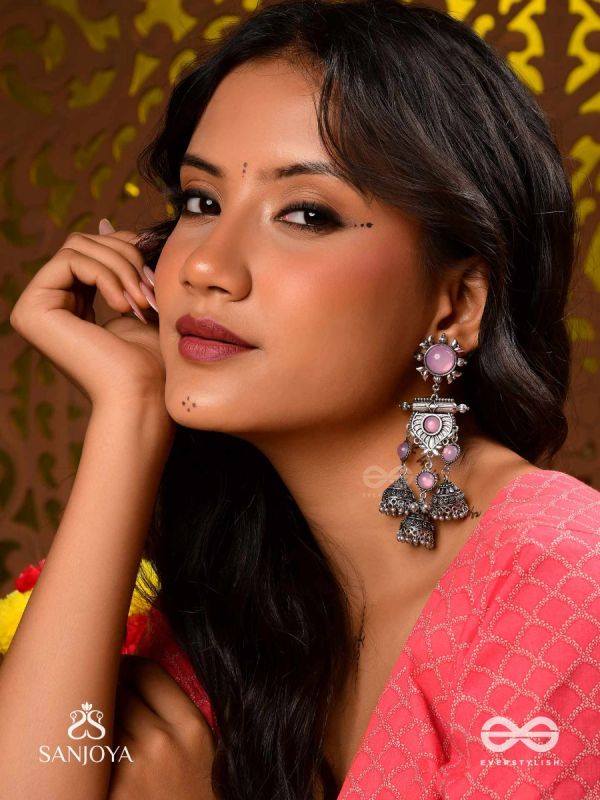VIJAYAMUKTA-VICTORY PEARLS- REGAL OXIDIZED EARRINGS WITH A CENTRAL PURPLE STONE AND LAYERED JHUMKAS