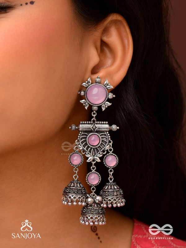 VIJAYAMUKTA-VICTORY PEARLS- REGAL OXIDIZED EARRINGS WITH A CENTRAL PURPLE STONE AND LAYERED JHUMKAS