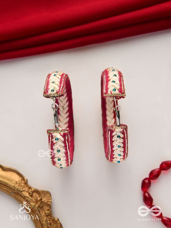 Vasantiruchi- Spring Charm- Embroidered earrings with red and white threads, decorated with beads and gold accents