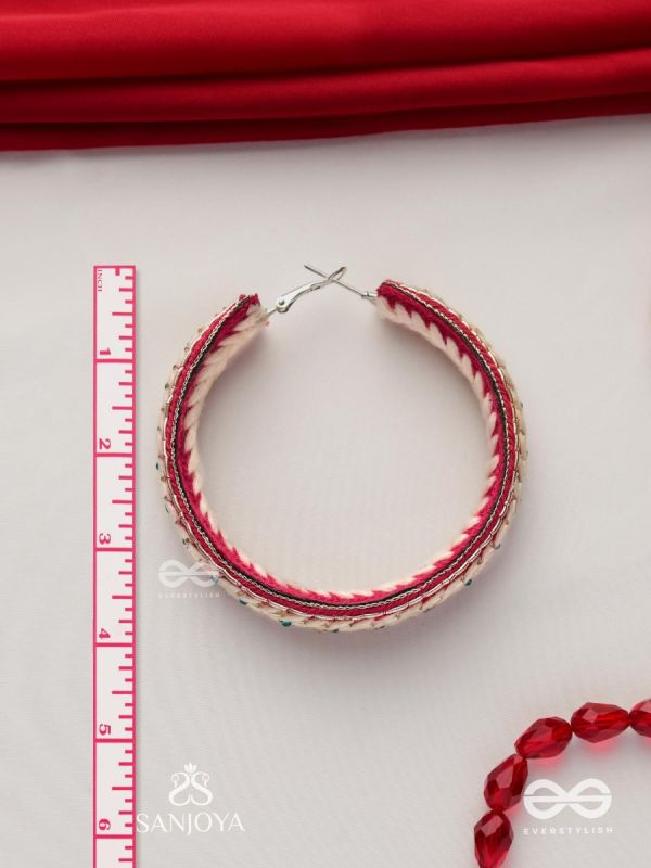 Vasantiruchi- Spring Charm- Embroidered earrings with red and white threads, decorated with beads and gold accents