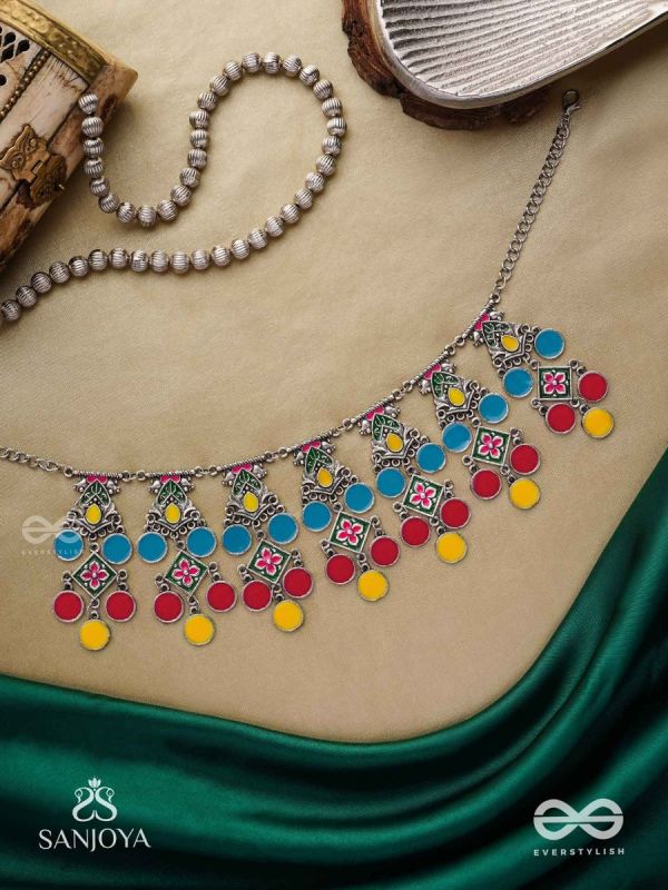 Manjari- Blossom Chain-Slender metallic chain with cascade of enamel designs.