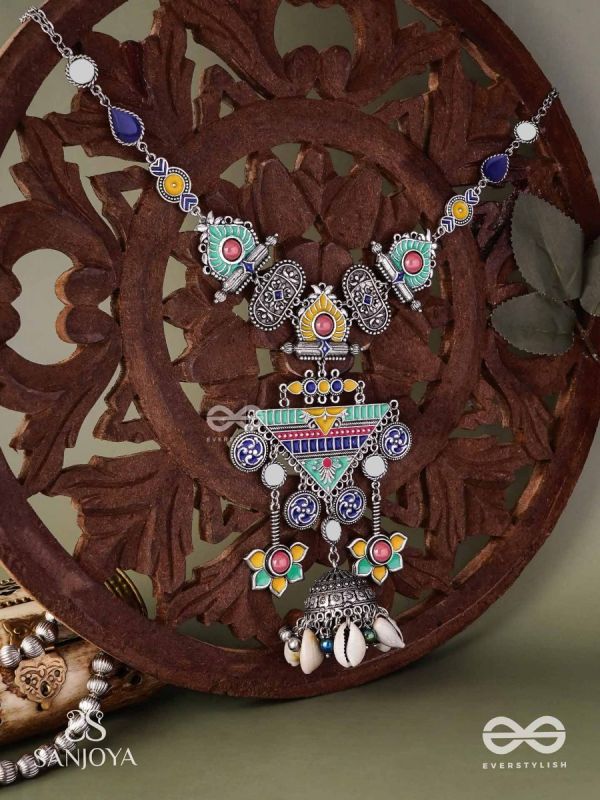 Rangapadma-Color bloom- Enamelled Neckpiece with cowrie shells,mirror and colorful gemstones on oxidized metalwork.