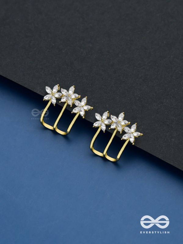 Queen’s delight - Crown shaped golden crystal studs 