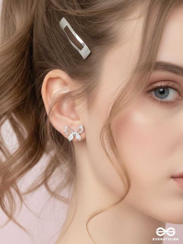 Pristine excellence - Crystal butterfly studs 