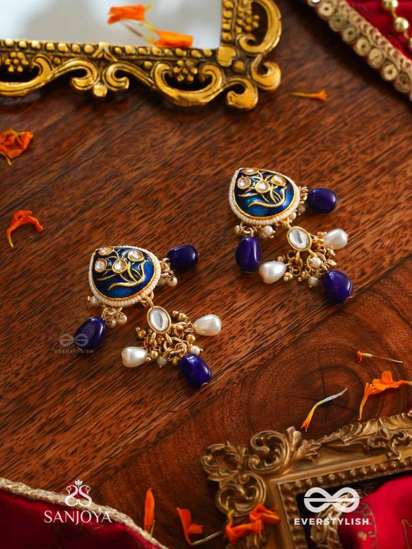 NILACHANDRIKA- MOONLIGHT OF THE BLUE SKY- KUNDAN EARRINGS WITH DEEP BLUE ENAMEL WORK WITH GOLDEN DETAILS, PEARLS, AND DAZZLING GEMS