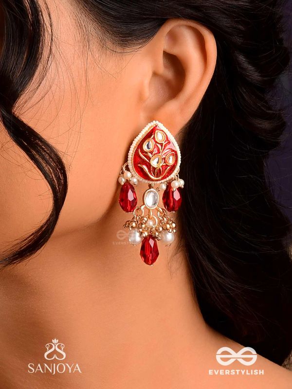 ARUNAMUKHI- FACE OF THE RED SUN- GLORIOUS KUNDAN EARRINGS WITH RED ENAMEL DETAILS AND PEARL EMBELLISHMENTS 