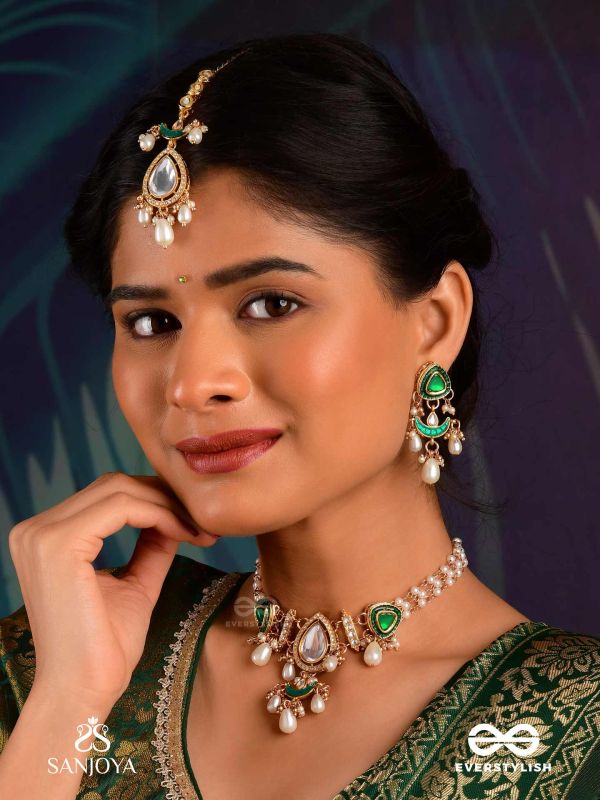 RATNODYA - RISING GEM - DAZZLING KUNDAN MAANGTIKA WITH PEARLS AND ROYAL GREEN AND GOLD ACCENTS