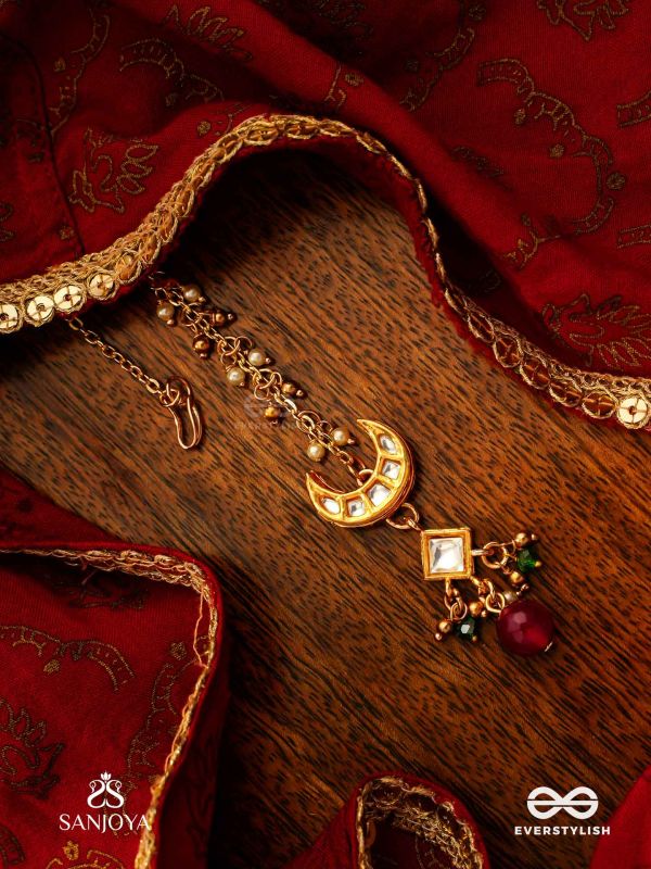 INDURAGA - MELODY OF THE MOON - ROYAL KUNDAN MAANGTIKA WITH CRESCENT MOTIFS AND RUBY DROPS