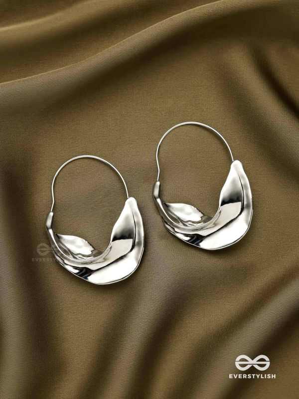 SILVER DRIFT- SCULPTED SILVER HOOPS WITH A FLUID