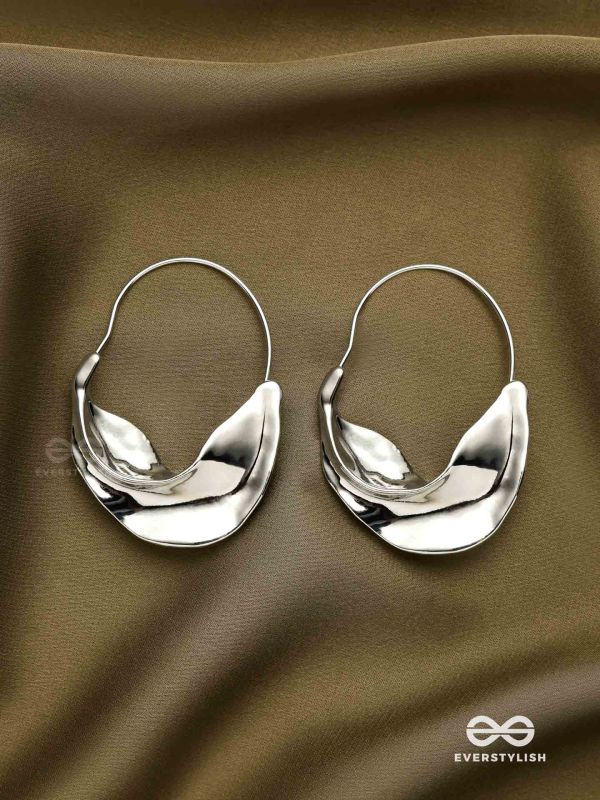 SILVER DRIFT- SCULPTED SILVER HOOPS WITH A FLUID
