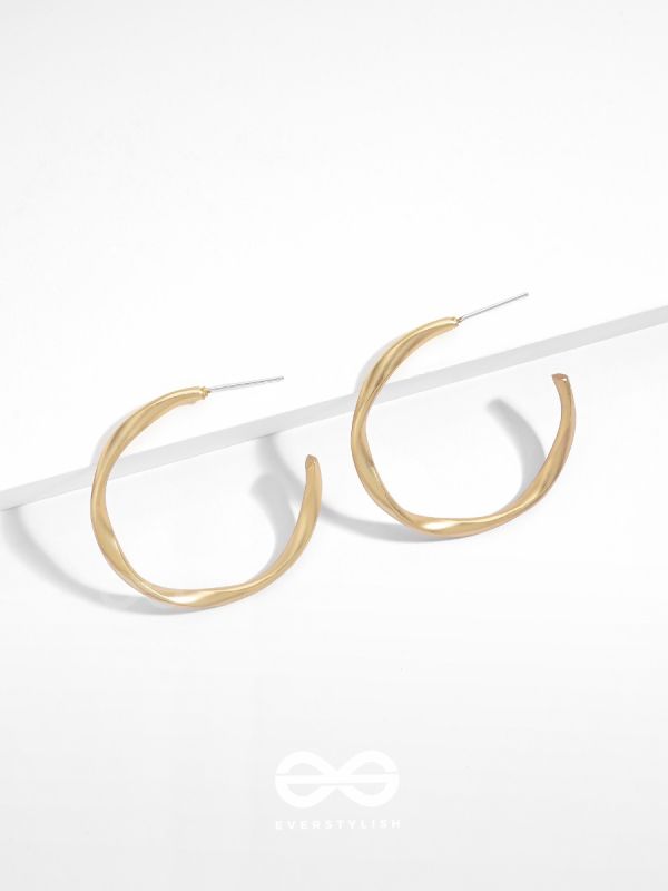 The Subtle Affirmation Golden Twists Hoop Earrings