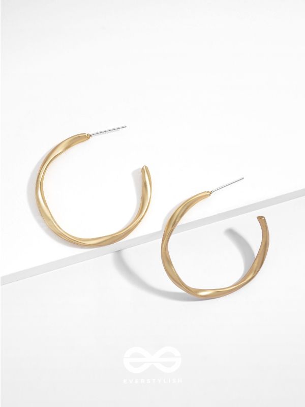 The Subtle Affirmation Golden Twists Hoop Earrings