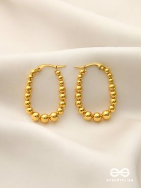 SUNBURST HOOPS – DELICATE DROP-SHAPED STAINLESS STEEL EARRINGS