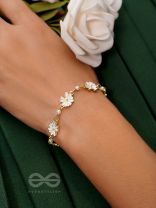 The Valley of Flowers- Enamelled Golden Bracelet (White)