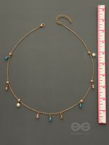 Rain In Paradise- Pearls And Crystals Studded Golden Necklace With Anti-Tarnish Coating