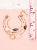 Day 'n' Nite- Pearl and Stones Studded Golden Bracelet