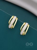 A CLASSY DAME - WHITE ENAMELLED GOLDEN STUDS