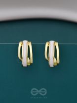 A CLASSY DAME - WHITE ENAMELLED GOLDEN STUDS