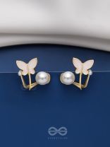 A WINGED WONDER - GOLDEN AND WHITE EAR JACKETS