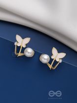 A WINGED WONDER - GOLDEN AND WHITE EAR JACKETS
