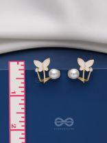 A WINGED WONDER - GOLDEN AND WHITE EAR JACKETS