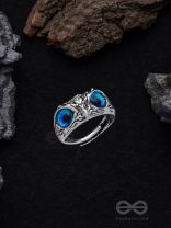 A KNOW-IT-OWL - BLUE EYED SILVER RING