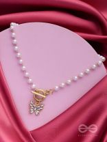 A FLYING MIRACLE - GOLDEN PEARL NECKPIECE