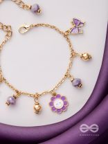 THE JOY OF LIVING - PURPLE CHARMED BRACELET