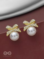 BOW-DAZZLE PEARLS - GOLDEN AND WHITE EMBELLISHED EARRINGS
