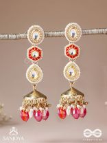 Suvarnmani - The Golden Gem –Golden enamel earrings adorned with gemstones and dangling beads