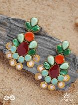 Vikṛtiśīla- Elegant Form-Chunky blue, green, and rust-colored stones with a distinctive golden-silver leaflet design