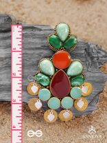 Vikṛtiśīla- Elegant Form-Chunky blue, green, and rust-colored stones with a distinctive golden-silver leaflet design