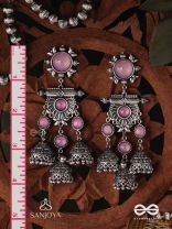 VIJAYAMUKTA-VICTORY PEARLS- REGAL OXIDIZED EARRINGS WITH A CENTRAL PURPLE STONE AND LAYERED JHUMKAS