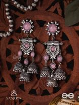 VIJAYAMUKTA-VICTORY PEARLS- REGAL OXIDIZED EARRINGS WITH A CENTRAL PURPLE STONE AND LAYERED JHUMKAS