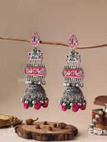 VAJRASHRINGARA-DIAMOND ADORNMENT-ENAMELLED OXIDISED MOTIFS SET ON SILVER METALWORK, EMBELLISHED WITH GLOSSY BEADS AND JHUMKAS