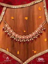 RUDRANJALI - SACRED RED OFFERING- TRADITIONAL RED ENAMELLED POLKI CHOKER WITH LUSTROUS BEADS AND PEARLS