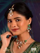 RATNODYA - RISING GEM - DAZZLING KUNDAN MAANGTIKA WITH PEARLS AND ROYAL GREEN AND GOLD ACCENTS