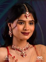 JWLALA - FLAME-LIKE BEAUTY - MAJESTIC HANDCRAFTED KUNDAN MAANGTIKA WITH ORNATE RED AND GOLDEN DETAILS