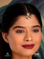 HARSHITA - THE JOYFUL ONE- DELICATE PEARL MAANGTIKA WITH MINI KUNDAN BLOOMS AND GREEN GEM DROPLETS