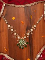 ARUNODAYA - DAWN RAYS- SYMMETRICAL KUNDAN POLKI NECKPIECE WITH EMERALD GREEN ENAMEL ACCENT, PEARLS AND BEADS