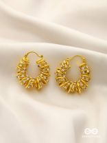 LUSTROUS SWIRLS-  INTRICATE TWISTED GOLD EARRINGS WITH SHIMMERING STONE