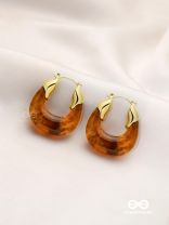 AMBER ARC- RICH BROWN RESIN HOOPS
